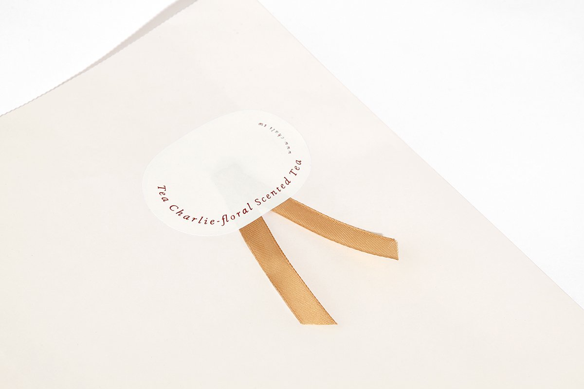 深圳VI設計  深圳VI策劃  茶查理花茶VI形象設計  標簽設計